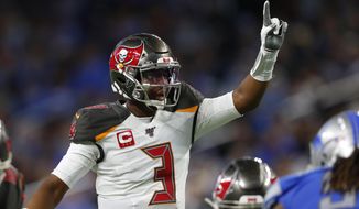Tampa Bay Buccaneers quarterback Jameis Winston signals during the first half of an NFL football game against the Detroit Lions, Sunday, Dec. 15, 2019, in Detroit. (AP Photo/Paul Sancya)
