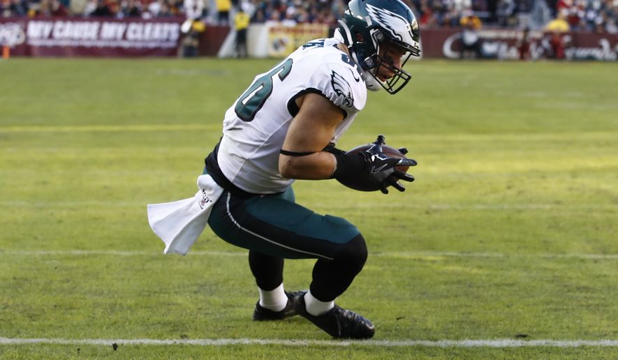 Philadelphia Eagles tight end Zach Ertz (86) scores a touchdown against the Washington Redskins in the second half of an NFL football game, Sunday, Dec. 15, 2019, in Landover, Md. (AP Photo/Patrick Semansky)