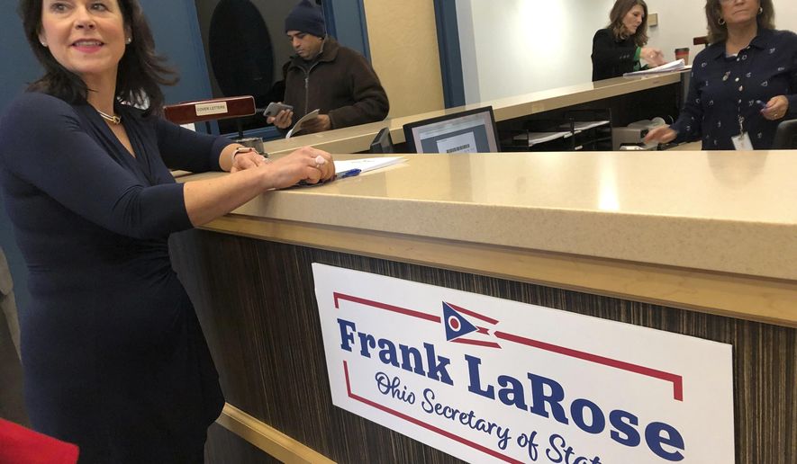 Ohio Republican Chairman Jane Timken files paperwork for President Donald Trump's re-election bid in Ohio at the secretary of state's office in Columbus, Ohio, on Monday, Dec. 16, 2019. (AP Photo/Julie Carr Smyth)