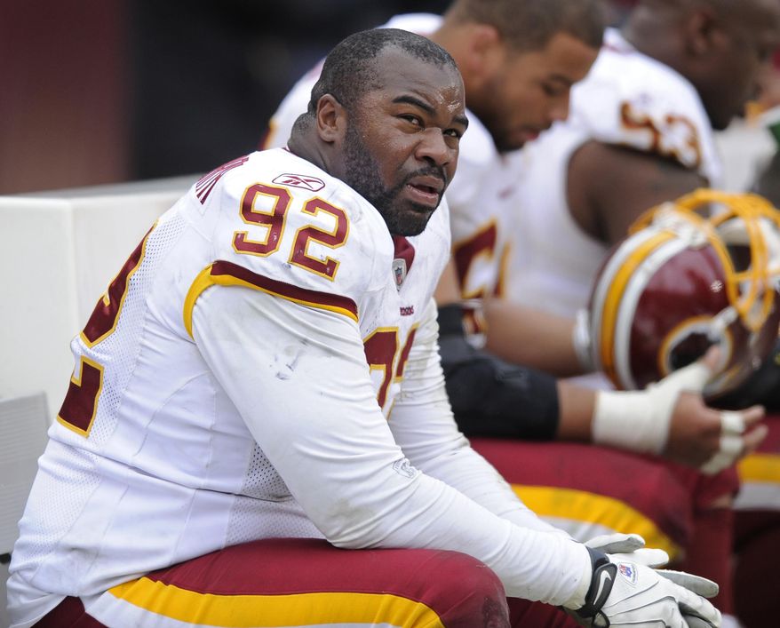 2010: The Allen regime didn’t sign Albert Haynesworth and DeAngelo Hall, but Allen dumped money from their massive contracts into the uncapped 2010 season that followed CBA negotiations to try to free up cap space in later seasons. They claimed the league office signed off on the move, but they were later assessed $36 million in cap penalties across 2012 and 2013. (AP Photo/Nick Wass, File)