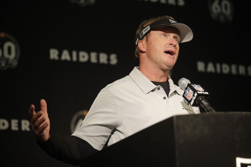 Oakland Raiders head coach Jon Gruden gestures during a news conference at the end of an NFL football game against the Jacksonville Jaguars in Oakland, Calif., Sunday, Dec. 15, 2019. (AP Photo/Ben Margot)