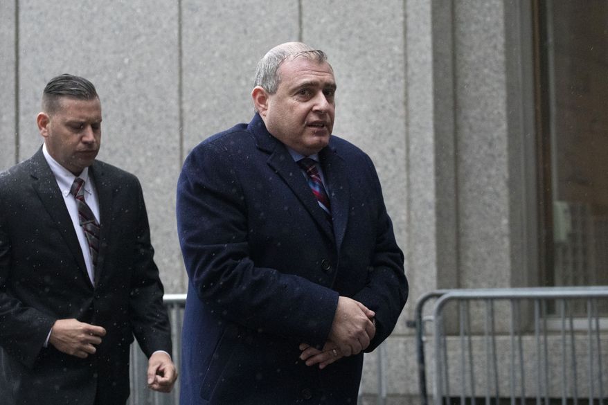Lev Parnas, right, a Rudy Giuliani associate with ties to Ukraine, arrives for a bail hearing in federal court, Tuesday, Dec. 17, 2019 in New York. (AP Photo/Mark Lennihan)