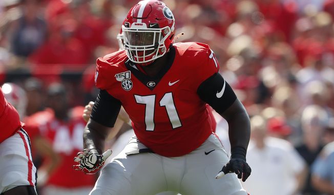 FILE - In this Sept. 7, 2019, file photo, Georgia offensive lineman Andrew Thomas (71) is shown in action during the first half of an NCAA college football game against the Murray State, in Athens, Ga. Thomas was selected to The Associated Press All-American team, Monday, Dec. 16, 2019. (AP Photo/John Bazemore, File)