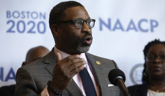 In this Thursday, Dec. 12, 2019 file photo, National Association for the Advancement of Colored People President Derrick Johnson faces reporters during a news in Boston, held to announce that the NAACP&#39;s 111th national convention is to take place in Boston, in July of 2020. Emails and recordings obtained by The Associated Press show that the NAACP&#39;s national president chastised women who went public with a sexual harassment claim. The records also show that Johnson was reluctant to swiftly deal with accusations against a former North Carolina officer in the civil rights organization. The emails also indicate that he knew about the complaint two years before he says he did. (AP Photo/Steven Senne, File)