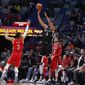 Brooklyn Nets guard Spencer Dinwiddie (8) attempts a 3-point shot against New Orleans Pelicans guard Josh Hart (3) in the first half of an NBA basketball game in New Orleans, Tuesday, Dec. 17, 2019. (AP Photo/Gerald Herbert)