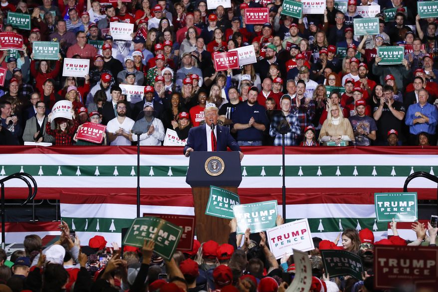 President Donald Trump speaks at a campaign rally in Battle Creek, Mich., Wednesday, Dec. 18, 2019. (AP Photo/Paul Sancya)