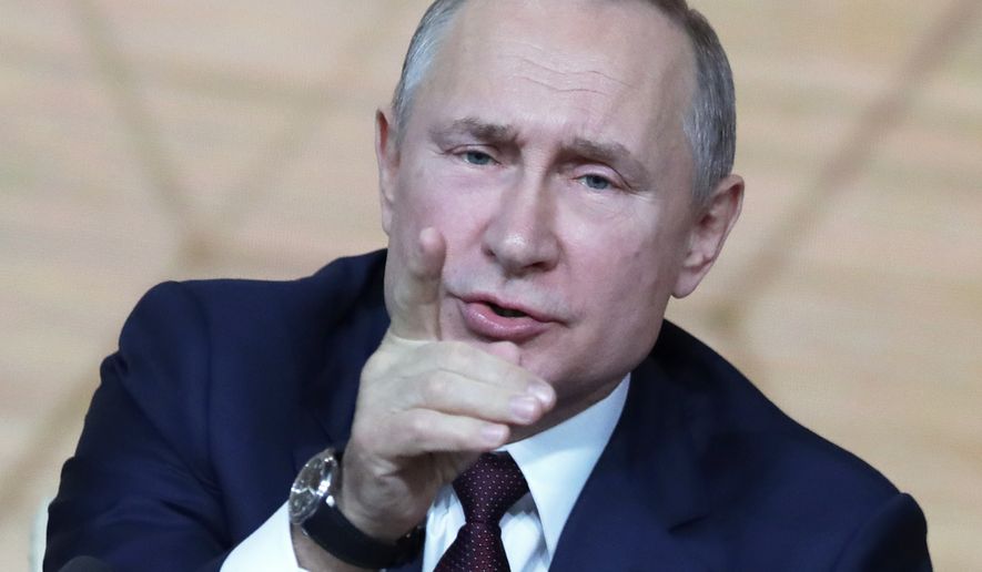 Russian President Vladimir Putin gestures during his annual news conference in Moscow, Russia, Thursday, Dec. 19, 2019. Russian President Vladimir Putin called the U.S. impeachment process &quot;far-fetched&quot; Thursday, making a seemingly obvious prediction that Donald Trump will be acquitted in the Senate. (AP Photo/Pavel Golovkin)
