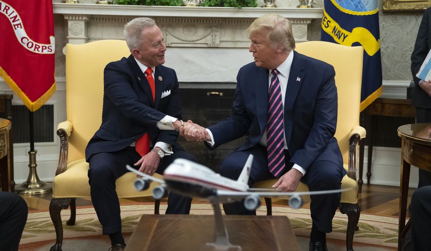 President Donald Trump meets with Rep. Jeff Van Drew, D-N.J., who is planning to switch his party affiliation, in the Oval Office of the White House, Thursday, Dec. 19, 2019, in Washington. (AP Photo/ Evan Vucci) ** FILE **