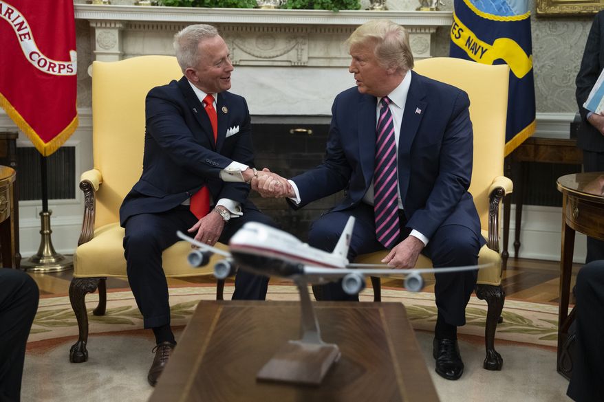 President Donald Trump meets with Rep. Jeff Van Drew, D-N.J., who is planning to switch his party affiliation, in the Oval Office of the White House, Thursday, Dec. 19, 2019, in Washington. (AP Photo/ Evan Vucci) ** FILE **