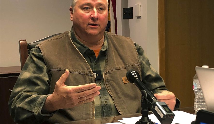 Ohio House Speaker Larry Householder speaks to journalists Thursday, Dec. 19, 2019, in his legislative office in downtown Columbus, Ohio. (AP Photo/Julie Carr Smyth)
