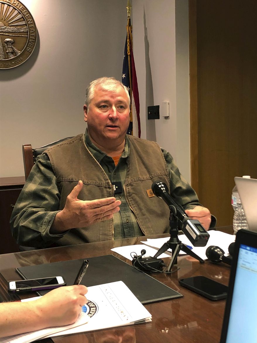 Ohio House Speaker Larry Householder speaks to journalists Thursday, Dec. 19, 2019, in his legislative office in downtown Columbus, Ohio. (AP Photo/Julie Carr Smyth)