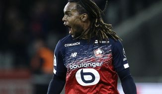 Lille&#39;s Renato Sanches reacts after scoring a penalty during the French League One soccer match between Lille and Montpellier at the Lille Metropole stadium, in Villeneuve d&#39;Ascq, northern France, Friday, Dec. 13, 2019. (AP Photo/Michel Spingler)