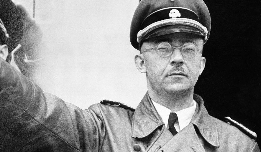 FILE - The undated file photo shows German Nazi party official and head of the SS, Heinrich Himmler. at unknown location in Germany. (AP Photo/str/file)