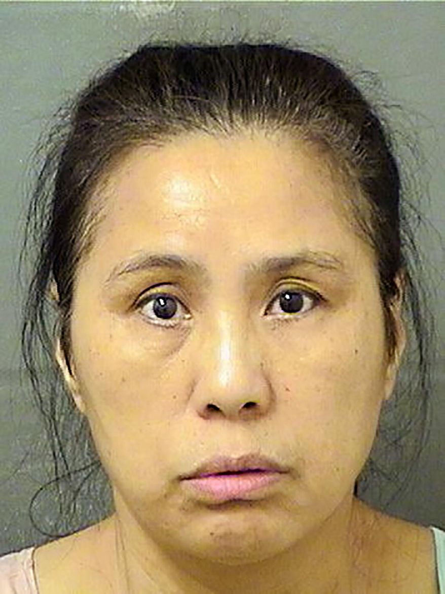 This Wednesday, Dec. 18, 2019, booking photo provided by the Palm Beach County Sheriff's Office, in Fla., shows Jing Lu. Lu, a Chinese national trespassed at President Donald Trump's Mar-a-Lago club Wednesday, and was arrested when she refused to leave, police said, the second time this year a woman from that country has been charged with illicitly entering the Florida resort. (Palm Beach County Sheriff's Office via AP)