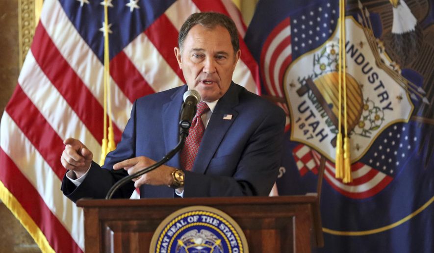 FILE - In this Sept. 12, 2018, file photo, Utah Gov. Gary Herbert speaks during a news conference at the Utah State Capitol, in Salt Lake City. Utah governor Gary Herbert has signed a sweeping overhaul of the state's tax system that lowers income tax while increasing taxes on food, fuel and several services. The Salt Lake Tribune reports Herbert defended the bill that cuts taxes by a net total of $160 million during his monthly news conference at PBS Utah. (AP Photo/Rick Bowmer, File)