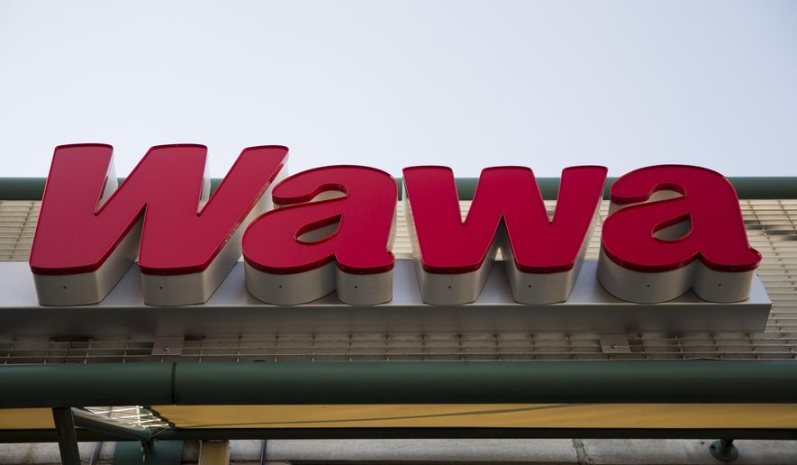 This April 2, 2015, file photo shows a Wawa convenience store in Philadelphia. The Wawa convenience store chain says a data breach may have collected debit and credit card information from thousands of customers, Thursday, Dec. 19, 2019. (AP Photo/Matt Rourke, File)