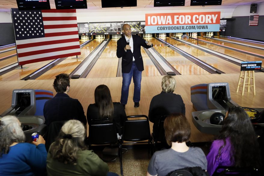 Democratic presidential candidate Sen. Cory Booker, D-N.J., speaks during a meet and greet at the Adel Family Fun Center, Friday, Dec. 20, 2019, in Adel, Iowa. (AP Photo/Charlie Neibergall)