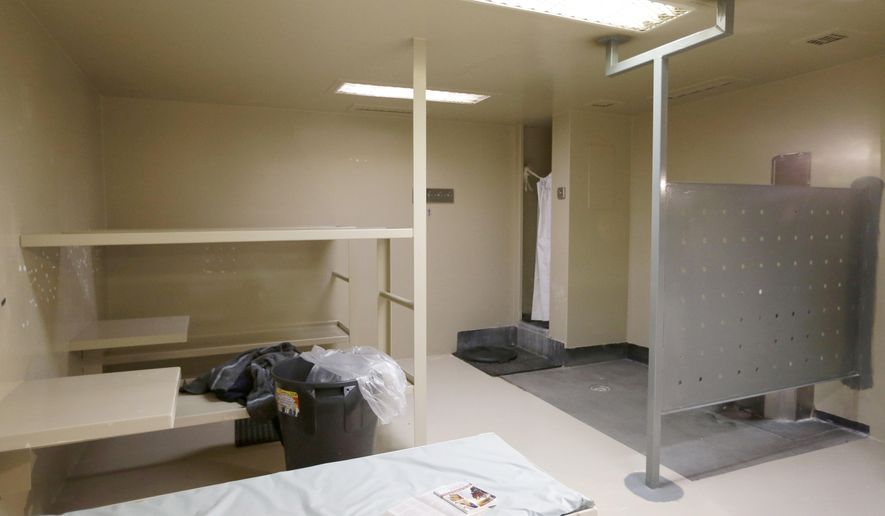 FILE - This July 22, 2015 file photo shows the Waller County jail cell in Hempstead, Texas, where Sandra Bland was found dead. “Jails are understaffed and often very understaffed,” said Diana Claitor, executive director of the Texas Jail Project, which advocates for inmates and their families. “You know you have to check a suicidal inmate, but at the same time, another crisis or fight occurs down the hall, and you have to go there. If you don’t have any extra personnel because someone is sick, you’re doing everything alone.” (AP Photo/Pat Sullivan, File)