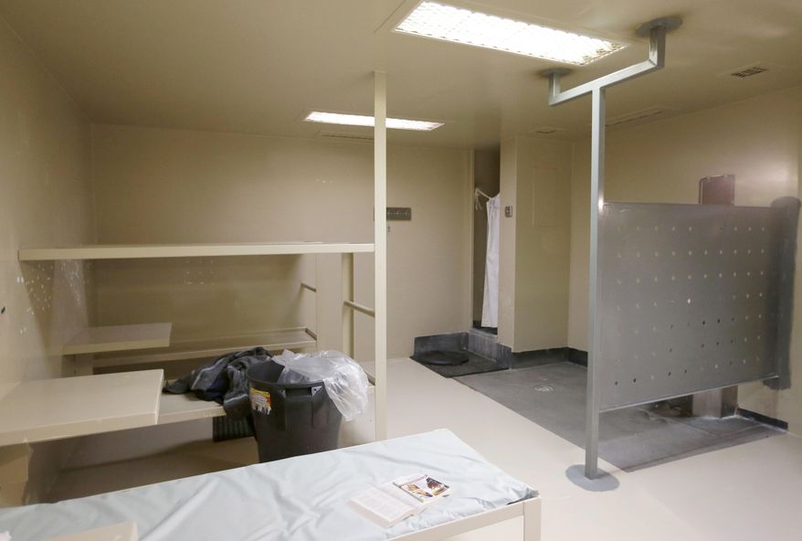 FILE - This July 22, 2015 file photo shows the Waller County jail cell in Hempstead, Texas, where Sandra Bland was found dead. “Jails are understaffed and often very understaffed,” said Diana Claitor, executive director of the Texas Jail Project, which advocates for inmates and their families. “You know you have to check a suicidal inmate, but at the same time, another crisis or fight occurs down the hall, and you have to go there. If you don’t have any extra personnel because someone is sick, you’re doing everything alone.” (AP Photo/Pat Sullivan, File)