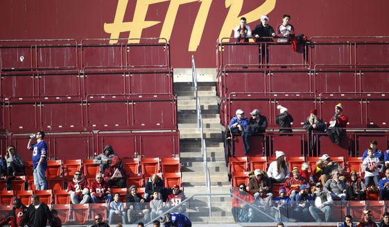 Empty standing room spots are seen at FedEx Field during the first half of an NFL football game between the Washington Redskins and the New York Giants, Sunday, Dec. 22, 2019, in Landover, Md. (AP Photo/Patrick Semansky) **FILE**