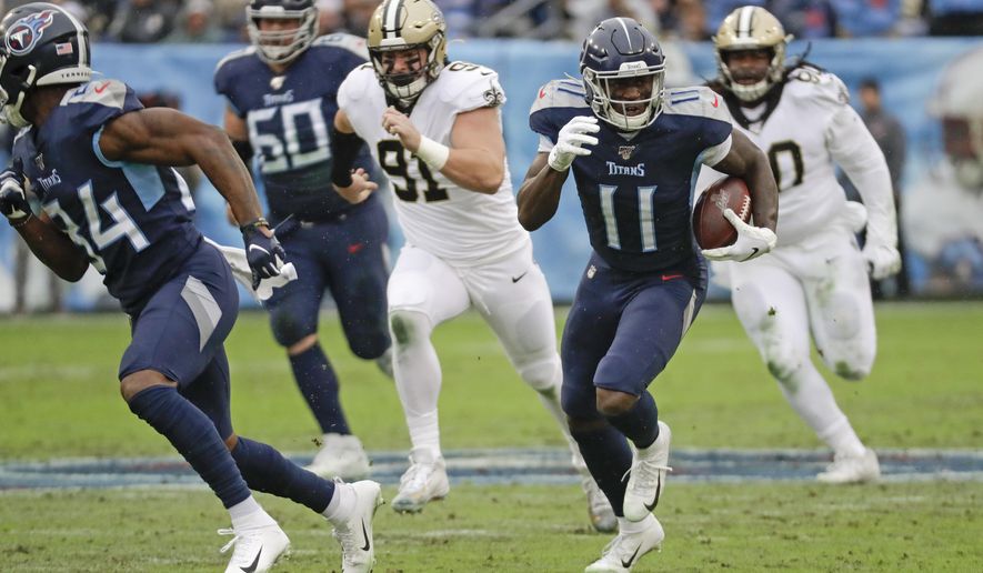 Tennessee Titans wide receiver A.J. Brown (11) runs 49 yards for a touchdown against the New Orleans Saints in the first half of an NFL football game Sunday, Dec. 22, 2019, in Nashville, Tenn. (AP Photo/James Kenney)