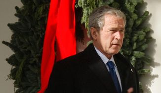 President George W. Bush would depart the White House before Christmas every year and stay at Camp David, &quot;so all of us could be with our families on Christmas.&quot; (Associated Press)