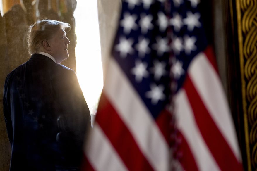 President Donald Trump departs following a Christmas Eve video teleconference with members of the military at his Mar-a-Lago estate in Palm Beach, Fla., Tuesday, Dec. 24, 2019. (AP Photo/Andrew Harnik)