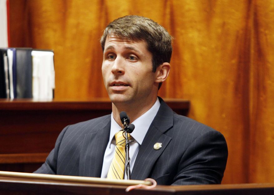 FILE - In this Aug. 6, 2013 file photo, U.S. State Department Special Agent Christopher Deedy testifies in court in Honolulu. Prosecutors pursuing a third trial against a federal agent for a fatal 2011 shooting in a Waikiki McDonald's restaurant plan to take their quest to the U.S. Supreme Court, Brooks Baehr, spokesman for the Honolulu prosecuting attorney's office, said Tuesday, Dec. 24, 2019. (Dennis Oda/Honolulu Star-Advertiser via AP, File)