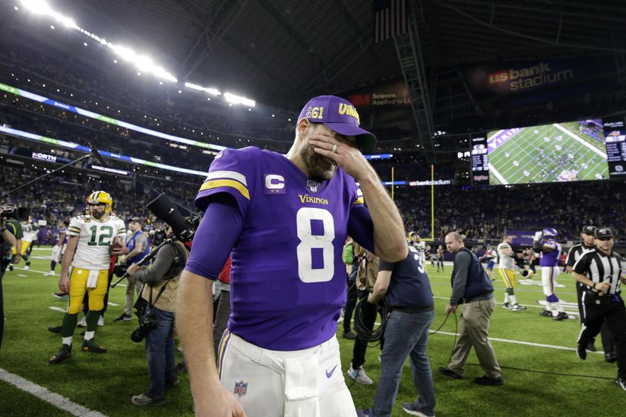 Minnesota Vikings quarterback Kirk Cousins (8) walks off the field after the team's NFL football game against the Green Bay Packers, Monday, Dec. 23, 2019, in Minneapolis. The Packers won 23-10. (AP Photo/Andy Clayton-King)