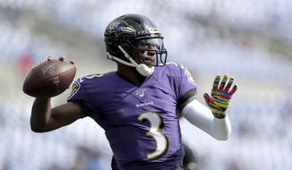 In this Oct. 13, 2019, file photo Baltimore Ravens quarterback Robert Griffin III works out prior to an NFL football game against the Cincinnati Bengals in Baltimore. It will be Griffin&#39;s first NFL start since 2016 on Sunday, Dec. 29. (AP Photo/Julio Cortez, File) **FILE**