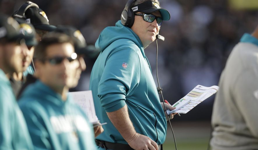 Jacksonville Jaguars head coach Doug Marrone stands on the sideline during the second half of an NFL football game against the Oakland Raiders in Oakland, Calif., Sunday, Dec. 15, 2019. (AP Photo/Ben Margot)