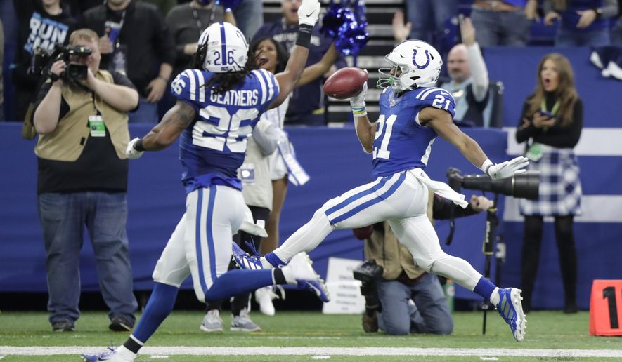 Indianapolis Colts' Nyheim Hines (21) celebrates as he runs back a punt for a touchdown during the second half of an NFL football game against the Carolina Panthers, Sunday, Dec. 22, 2019, in Indianapolis. (AP Photo/Michael Conroy)