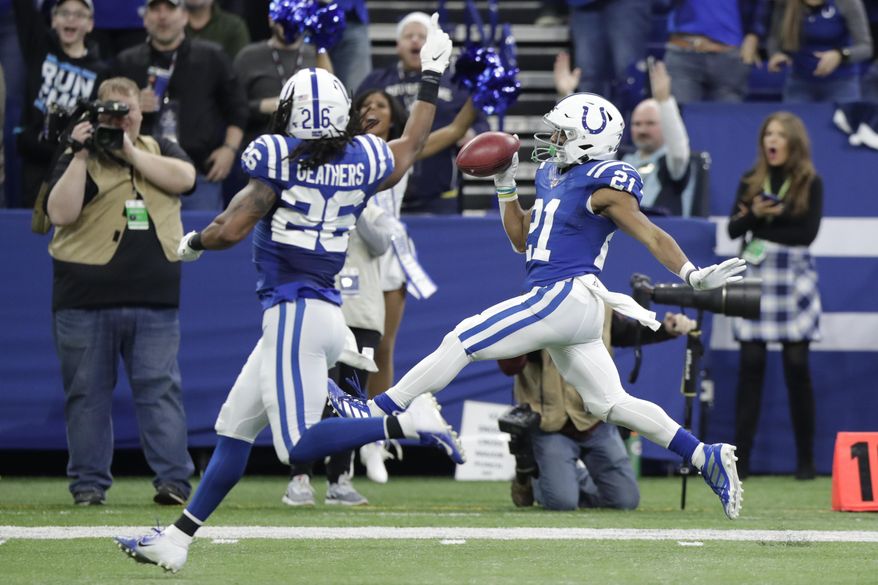 Indianapolis Colts' Nyheim Hines (21) celebrates as he runs back a punt for a touchdown during the second half of an NFL football game against the Carolina Panthers, Sunday, Dec. 22, 2019, in Indianapolis. (AP Photo/Michael Conroy)