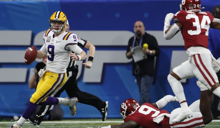 LSU quarterback Joe Burrow (9) runs out of the pocket against Oklahoma during the first half of the Peach Bowl NCAA semifinal college football playoff game, Saturday, Dec. 28, 2019, in Atlanta. (AP Photo/John Bazemore)