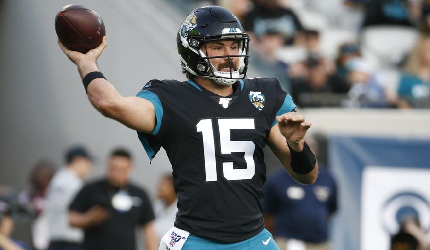 Jacksonville Jaguars quarterback Gardner Minshew II (15) throws a pass against the Indianapolis Colts during the first half of an NFL football game, Sunday, Dec. 29, 2019, in Jacksonville, Fla. (AP Photo/Stephen B. Morton)