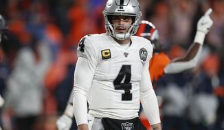 Oakland Raiders quarterback Derek Carr reacts after missing a two-point attempt during the second half of an NFL football game against the Denver Broncos, Sunday, Dec. 29, 2019, in Denver. (AP Photo/David Zalubowski)