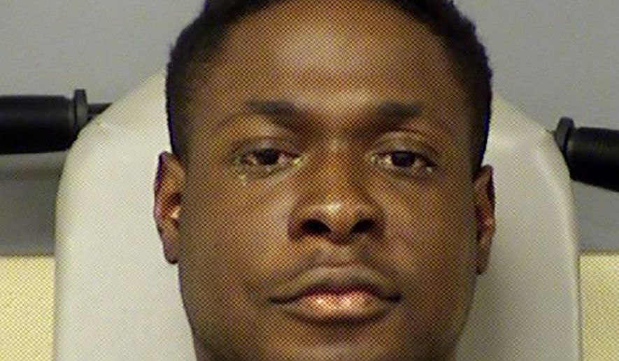 This undated photo provided by the Travis County Sheriff's Office shows Michael Egwuagu. The former University of Texas at San Antonio football player has been arrested and charged in the fatal stabbing of his sister at a home north of Austin. The Travis County sheriff’s office says Egwuagu was charged with murder in the killing of his sister in Pflugerville, Texas, Friday, Dec. 27, 2019. (Travis County Sheriff's Office via AP)