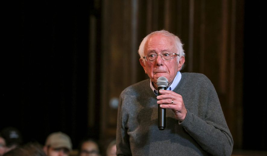 Democratic presidential candidate Sen. Bernie Sanders, I-Vt., listens as an audience member poses a question at a Newport Town Hall Breakfast Sunday, Dec. 29, 2019, at the Newport Opera House in Newport, N.H. (AP Photo/Cheryl Senter)