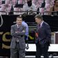 Washington Redskins owner Dan Snyder, left, and general manager Bruce Allen talk before an NFL football game against the New Orleans Saints in New Orleans, Monday, Oct. 8, 2018. (AP Photo/Bill Feig) **FILE**

