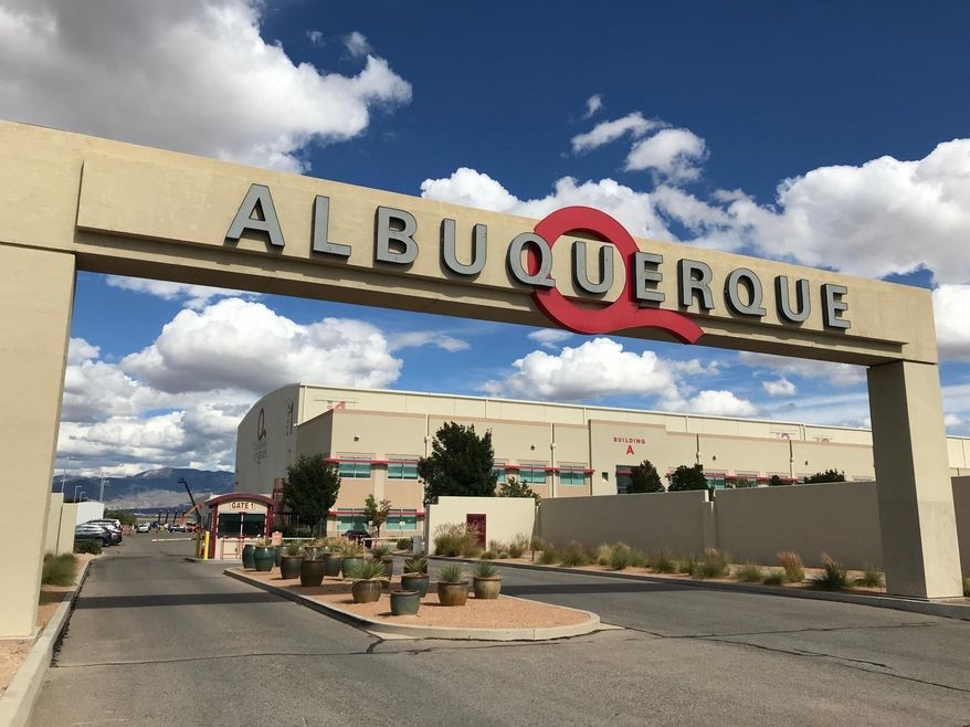 FILE - This Oct. 8, 2018, file photo shows the entrance to ABQ Studios in Albuquerque, N.M., where Netflix announced at the studio complex that it chose Albuquerque as a new production hub. New Mexico legislators want greater accountability regarding state grants and tax incentives for businesses that are designed to create jobs. The push comes as the state ramps up financial support to a variety of industries from film production to hemp cultivation and art venues. (AP Photo/Susan Montoya Bryan, File)