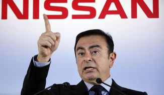 In this May 11, 2012, file photo, then Nissan Motor Co. President and CEO Carlos Ghosn speaks during a press conference in Yokohama, near Tokyo. A close friend says Monday, Dec. 30, 2019, that Ghosn, who is awaiting trial in Japan, has arrived in Beirut. It was not clear how Ghosn, who is of Lebanese origins, left Japan where he is under surveillance and is expected to face trial in April 2020. (AP Photo/Koji Sasahara, File)