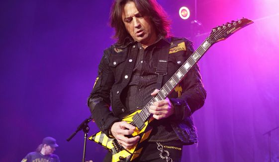 &quot;The minute some people hear the word &#39;Christian&#39; they run away from it as fast as they can,&quot; Michael Sweet of the rock band Stryper said. (Associated Press)