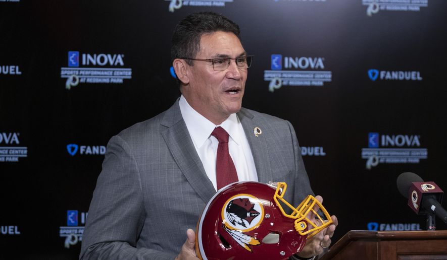 Washington Redskins new head coach Ron Rivera holds up a helmet during a news conference at the team&#39;s NFL football training facility, Thursday, Jan. 2, 2020 in Ashburn, Va. (AP Photo/Alex Brandon)  **FILE**