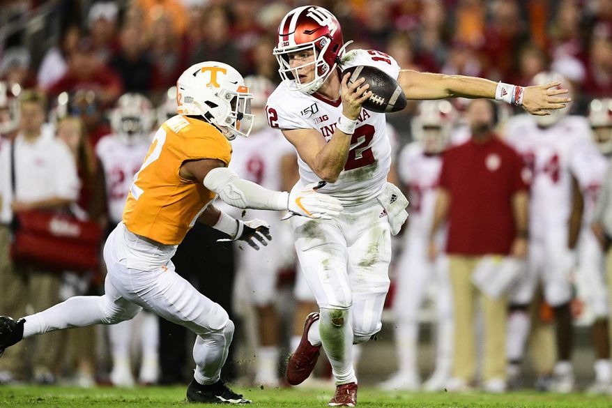 Tennessee defensive back Shawn Shamburger (12) sacks Indiana quarterback Peyton Ramsey (12) during the Gator Bowl NCAA college football game in Jacksonville, Fla., Thursday, Jan. 2, 2020. (Calvin Mattheis/Knoxville News Sentinel via AP)