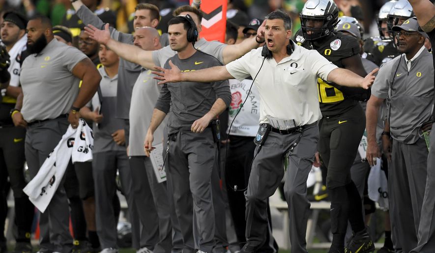 Oregon head coach Mario Cristobal reacts during second half of the Rose Bowl NCAA college football game against Wisconsin Wednesday, Jan. 1, 2020, in Pasadena, Calif. (AP Photo/Mark J. Terrill)