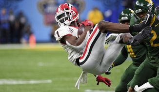 Georgia wide receiver George Pickens (1) is upended by Baylor linebacker Blake Lynch (2) during the first half of the Sugar Bowl NCAA college football game in New Orleans, Wednesday, Jan. 1, 2020. (AP Photo/Bill Feig)