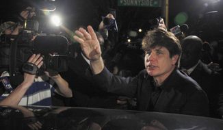 FILE - In this March 15, 2012 file photo, former Democratic Illinois Gov. Rod Blagojevich departs his Chicago home for Littleton, Colo., to begin his 14-year prison sentence on corruption charges. Blagojevich, authored, a column appearing on the conservative website Newsmax Jan. 1, 2020, arguing that Democrats in the U.S. House of Representatives would have tried to impeach former President Abraham Lincoln. (AP Photo/Charles Rex Arbogast, File)