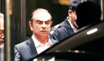 In this April 25, 2019, former Nissan Chairman Carlos Ghosn leaves the Tokyo Detention Center in Tokyo. A Japanese court has turned down an appeal from the lawyers of Ghosn over his bail conditions that limit his contact with his wife. Kyodo News service reported Thursday the Tokyo District Court rejected the appeal filed earlier in the day. (AP Photo/Eugene Hoshiko, File)