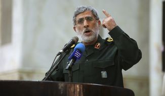 In this May 24, 2017 file photo, Gen. Esmail Ghaani speaks in a meeting at the shrine of the late revolutionary founder Ayatollah Khomeini just outside Tehran, Iran. (Hossein Zohrevand/Tasnim News Agency via AP) **FILE**