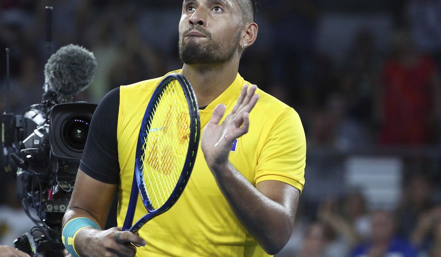 Nick Kyrgios of Australia reacts after winning his match against Jan-Lennard Struff of Germany at the ATP Cup tennis tournament in Brisbane, Australia, Friday, Jan. 3, 2020. (AP Photo/Tertius Pickard)